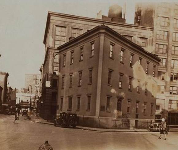 30 Christopher Street is just visible behind the Northern Dispensary c. 1928. Courtesy of NYPL Digital Gallery.