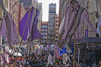 People gather at the site of the fire for the 100th Commemoration of the fire. 