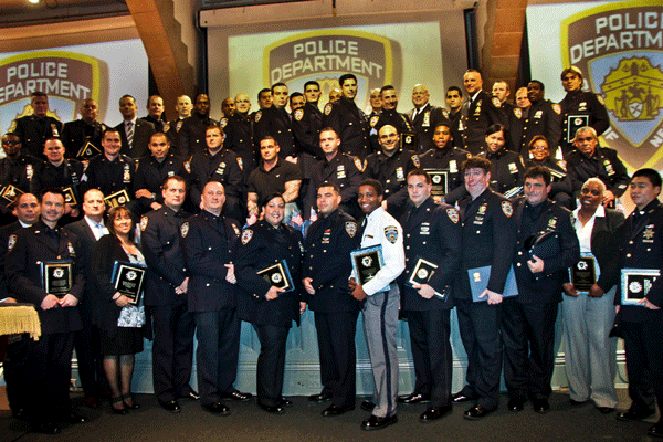 Members of the Ninth Precinct pose with their awards. 