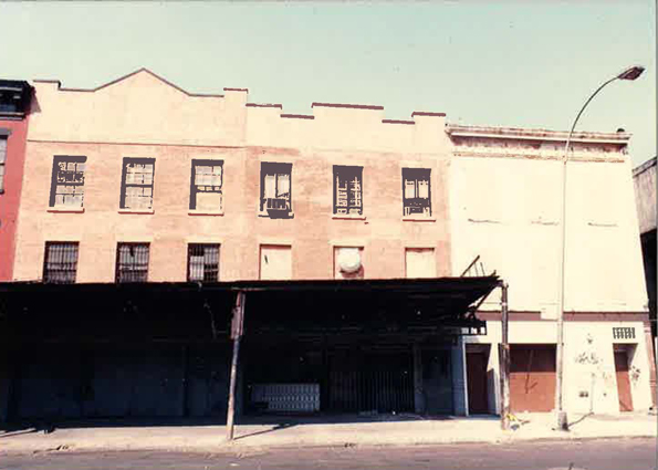 (left to right) 57 to 51 Little West 12th Street in 1989. Photograph by GVSHP.