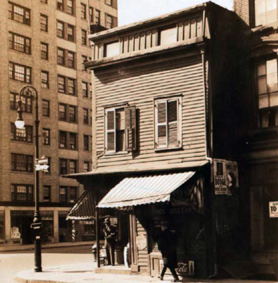 Another view of the corner building on the Christopher Street side from 1934. Image via NYPL.