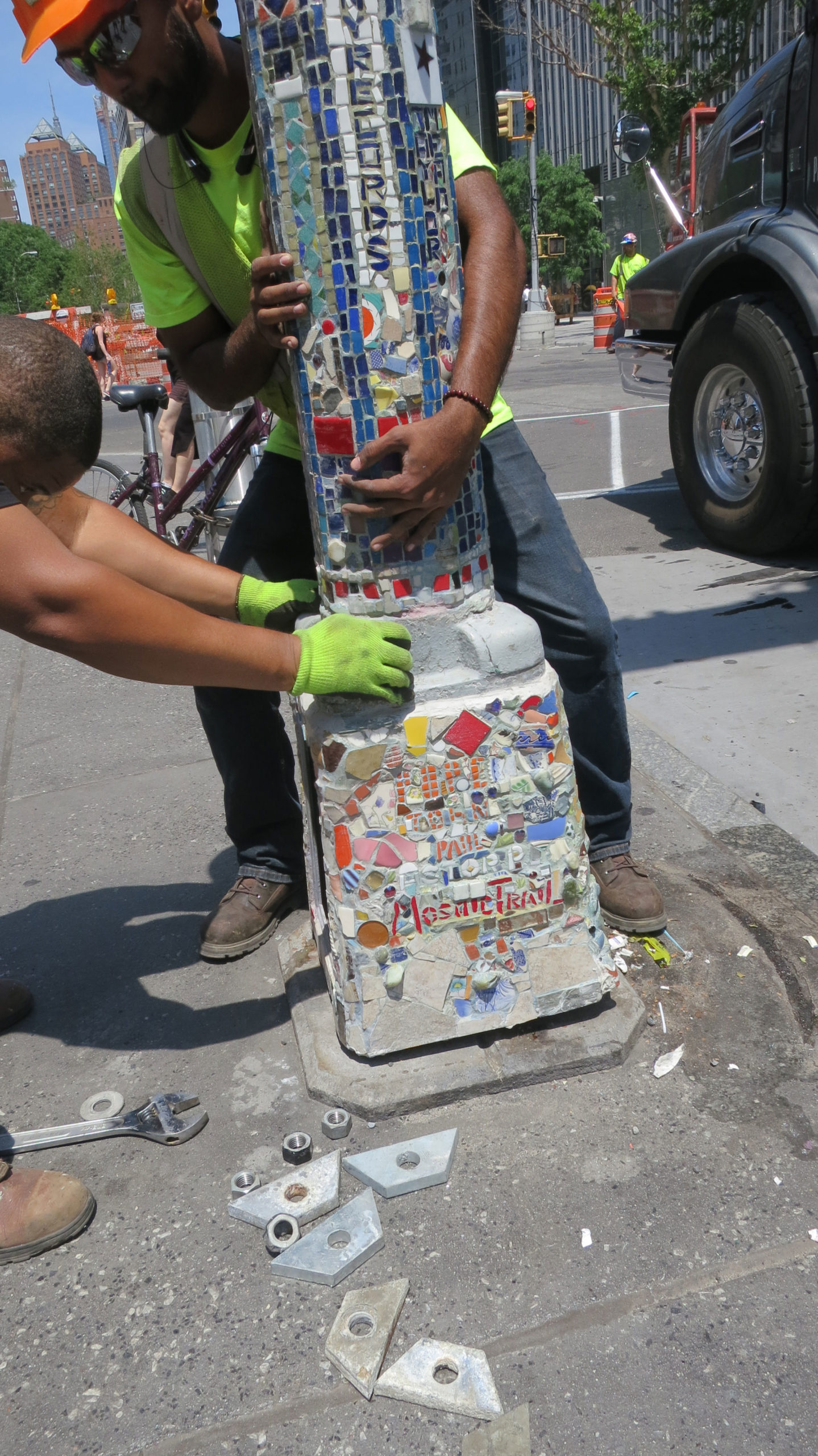 Mosaic being installed. Photo by Julie Powell