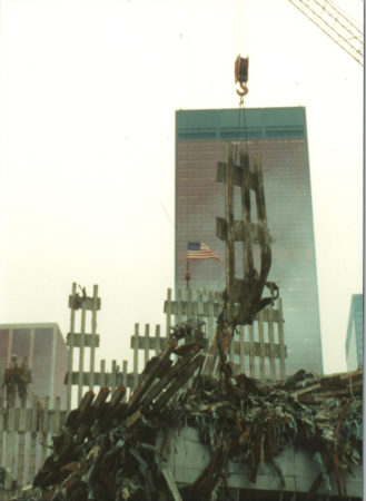 Crane Lifting Debris at Ground Zero with One Liberty Plaza Sheathed in the Background