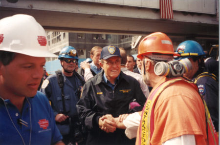 Unknown Workers Shaking Rudy Guilian's Hand