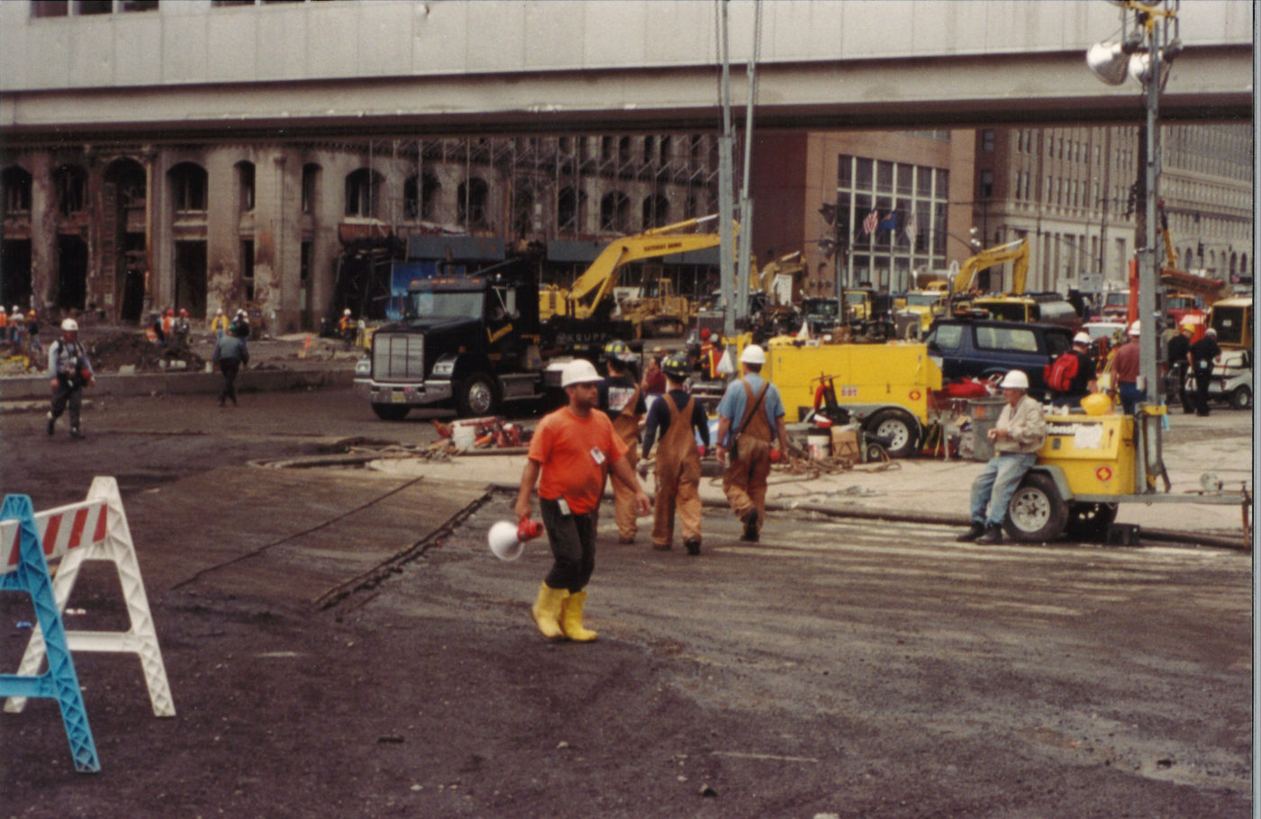 Men Walking to and from Ground Zero