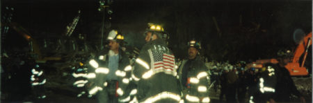 Photo of Three Fire Fighters at Night at Ground Zero