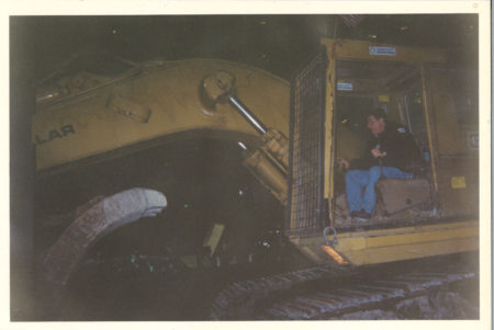 Unknown worker on heavy machiney at Ground Zero