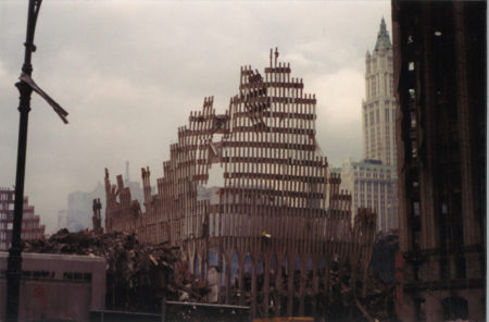 View of the Falling Frame of the WTC with the Woolworth in the Back