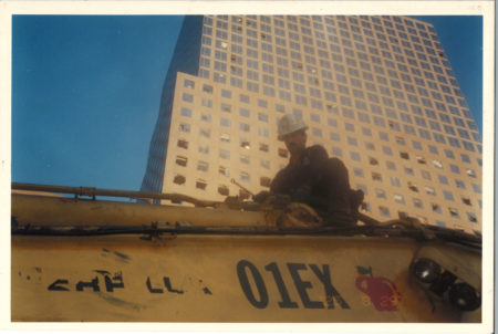 Worker on Crane Arm