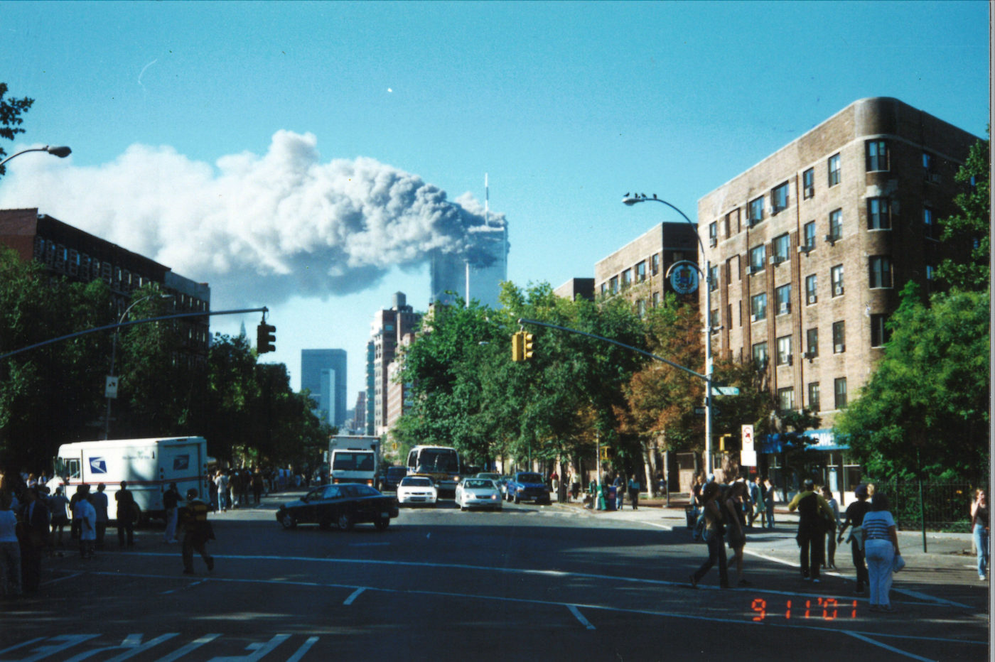 Crowds of New Yorkers Watching the Towers on Burn Looking South From Bleecker Street and 6th Avenue horizontal.jpg